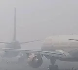 255 flights delayed 43 cancelled 15 diverted at Delhi airport due to fog shrouds north India