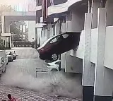 Car Crashes Through First Floor Parking as Driver Accidentally Engages Reverse Gear in Pune Viral Video