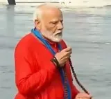 Prime Minister Modi in Prayagraj: Takes Holy Dip at Triveni Sangam
