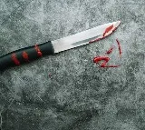Man cuts young man hand for sending messages to his wife