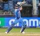 Kohli century steers India win against Pakistan