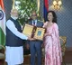 PM Modi hands over OCI cards to Mauritius President, First Lady