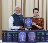 PM Modi presented with 80-volume World Tipitaka phonetic recitation by Thai counterpart