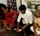 Telangana CM eats lunch with beneficiary family of fine rice scheme