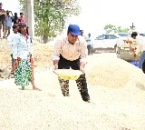 Medak District Collector Turns Farm Laborer, Sieves Paddy at Procurement Centre
