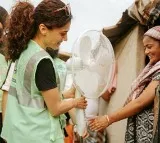 Taapsee Pannu Distributes Fans and Coolers to Mumbai Slum Dwellers