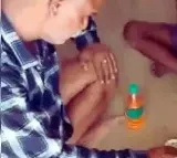 Viral Video Shows Teacher Drinking Alcohol with Students in Class