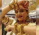 Gold Slips as Dollar Strengthens and US-China Trade Tensions Ease
