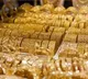 Strong Dollar, Global Peace Hopes Push Gold Prices Down