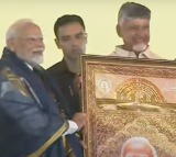 PM Modi Honored with Kalamkari Portrait in Andhra Capital Ceremony