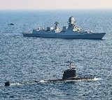 Indian Navy Shares Image of Warship Submarine and Helicopter