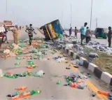 Cool Drink Van Overturns on Vijayawada Machilipatnam Highway