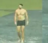 Tim Davids Playful Swim in Flooded Chinnaswamy Stadium