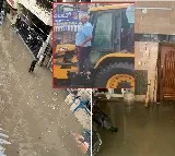 MLA Inspects Bangalore Flood Hit Areas on JCB