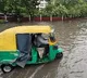 Delhi Rain Causes Flooding Flight Diversions