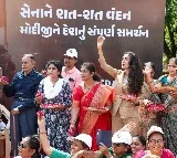 Narendra Modi showered with flowers by Colonel Sophia Qureshi family