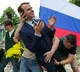 Emmanuel Macron Statue Stolen by Protesters in Paris