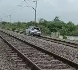 Woman drives car on railway track in Telangana