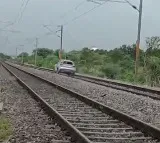 Rangareddy Woman Drives Car on Train Tracks for Social Media Reels