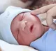 Li in China shocked by unexpected birth after stomach pain