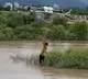 Vietnam Farmer Uses Drone to Rescue Children Stranded in Flood