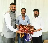 Revanth Reddy Busy in Delhi Talks with Ajay Devgn Kapil Dev