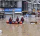 Beijing issues 'blue alert' for rainstorms