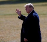 Trump visits Texas flooded area, dismissing criticism on alerts