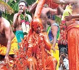 Periyakaruppu Temple priest showered with spicy water in Tamil Nadu