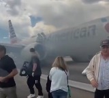 Flight's landing gear catches fire at US airport; aborts takeoff