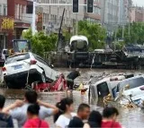 China Floods Kill 34 in Beijing Heavy Rains