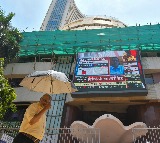 Indian stock market defies US tariffs, settles slightly lower