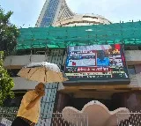 Indian stock market defies US tariffs, settles slightly lower
