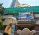 Indian stock market defies US tariffs, settles slightly lower
