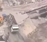 Dam Collapses In Himachal Amid Heavy Rainfall Vehicles Swept Away Video Viral