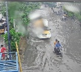 Hyderabad Rains Heavy Rain Causes Traffic Jams in Cyber City