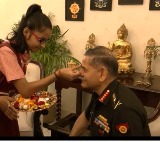 Schoolgirls tie 'rakhi' to Army Chief; military reaffirms its pledge to protect country