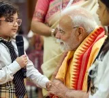 PM Modi celebrates Raksha Bandhan at 7 LKM; children & Brahma Kumaris tie 'rakhi' to him