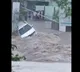 Adilabad Floods Car Washed Away in Adilabad Heavy Rains
