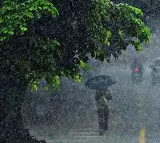 Hyderabad Wakes Up To Rain Causing Traffic Snarls