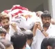 Chiranjeevi Carries Mother in Laws Bier