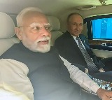 Bonhomie on display as PM Modi Putin travel in same car