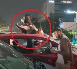 Delhi Traffic Frustration Man Carries Bike on Head in Viral Video