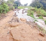 Road washed away due to heavy rains in Rajampet