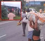 Coconut Load Truck Accident in Suryapet Locals Loot Coconuts