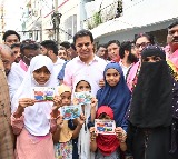 KTR distributes Congress Debt Cards in Jubilee Hills