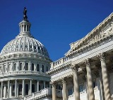 US government shuts down in political standoff with dim prospects of early deal (Lead)