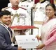 Droupadi Murmu Presents NSS Awards to Two AP Youths