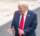 Trump says some furloughed workers might not get back pay