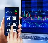 Sensex Ends Higher Amid Volatility